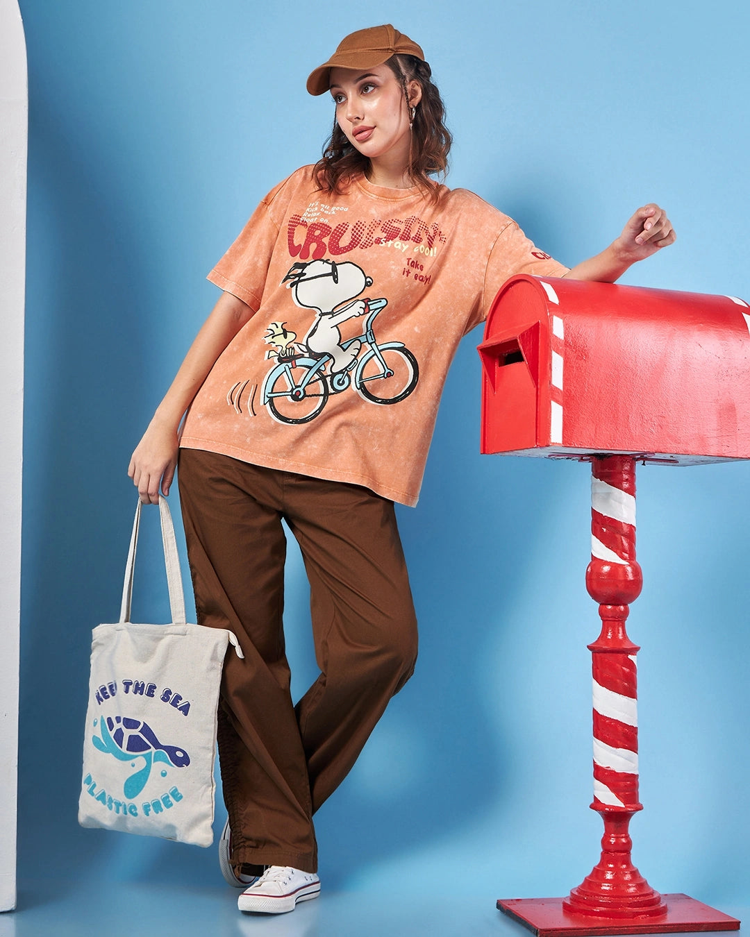 Trendy Oversized Women’s T-Shirt with Snoopy Cruisin Graphic in Orange