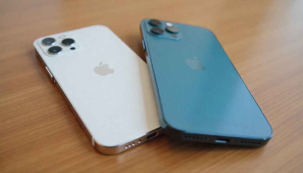 iPhone 17 and iPhone 17 Pro on table showing front and back design